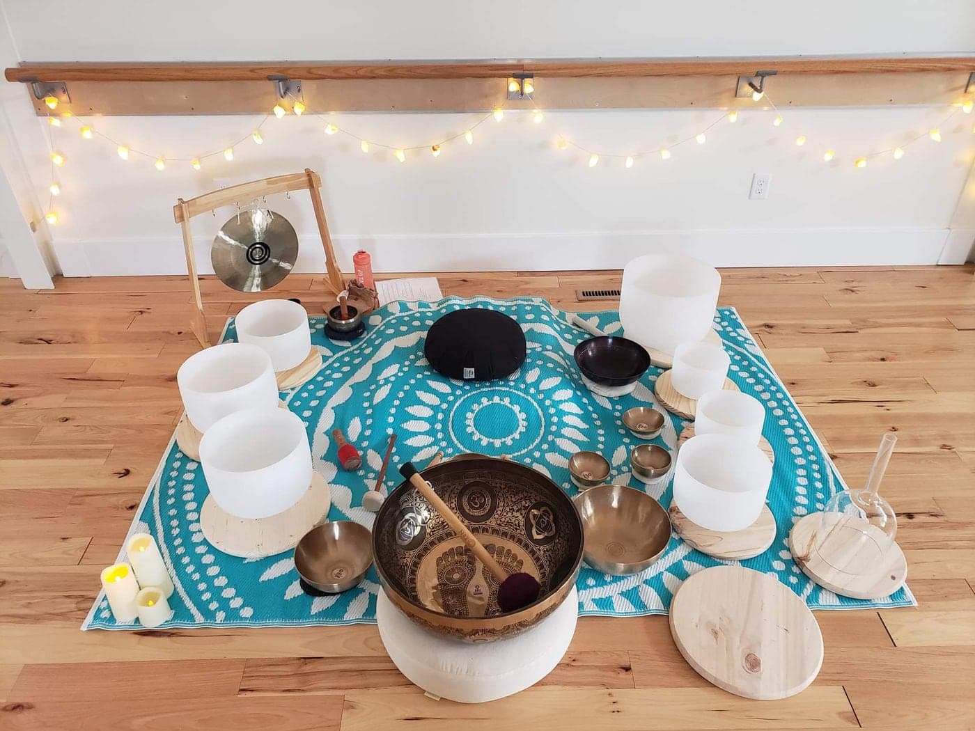 Crystal and Himalayan singing bowls arranged for a Journey of Sounds group session